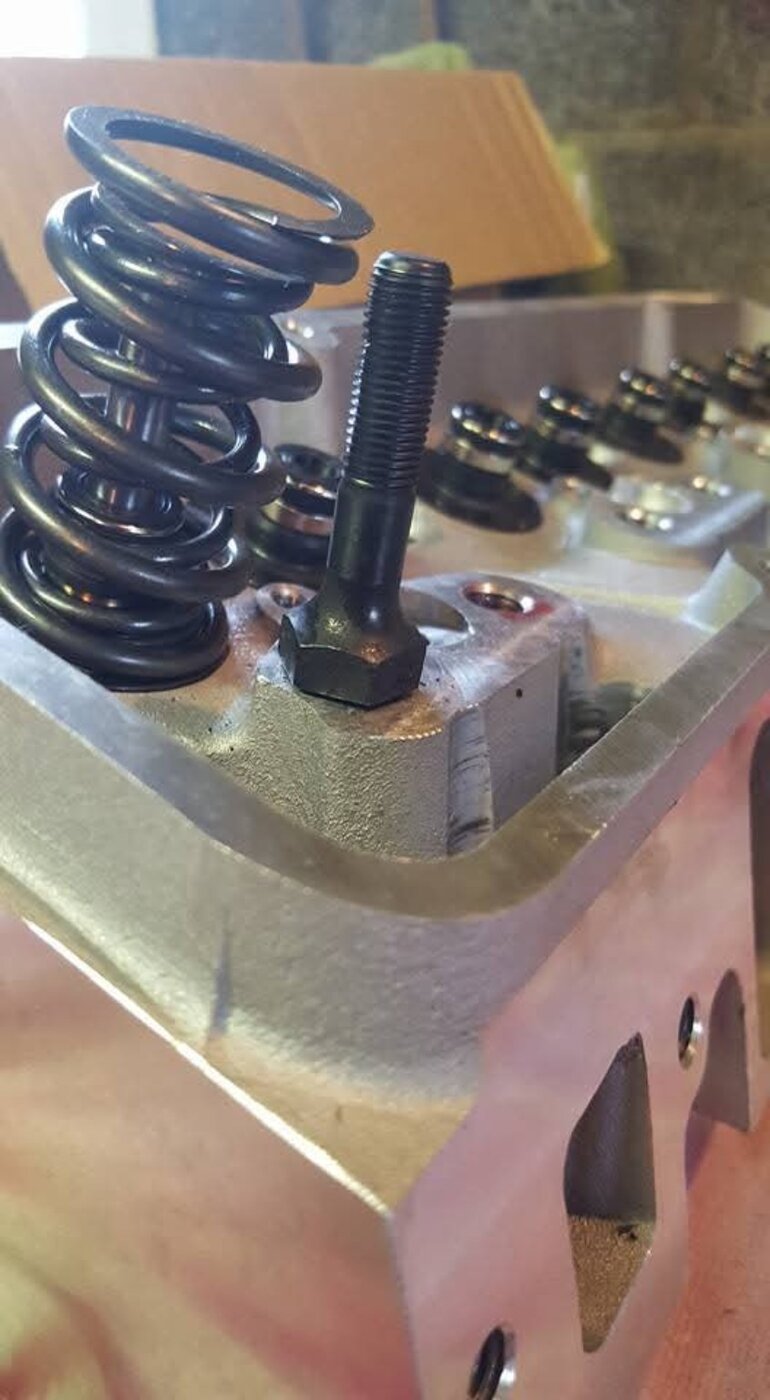A valve-spring detail photographed during cylinder-head work.